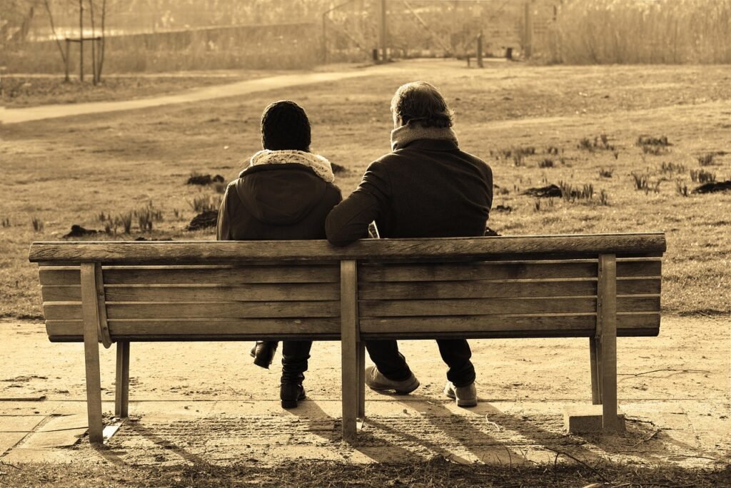 people, man, woman, couple, sitting, together, bench, talking, close, conversation, brown talk, brown talking, brown conversa