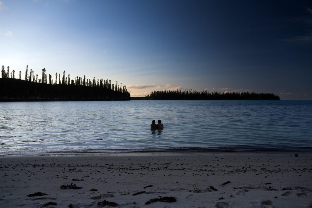 couple, romance, ils des pins, beach, together, relationship, sunset, island, tropical island, ocean, sea, sky, nature, water