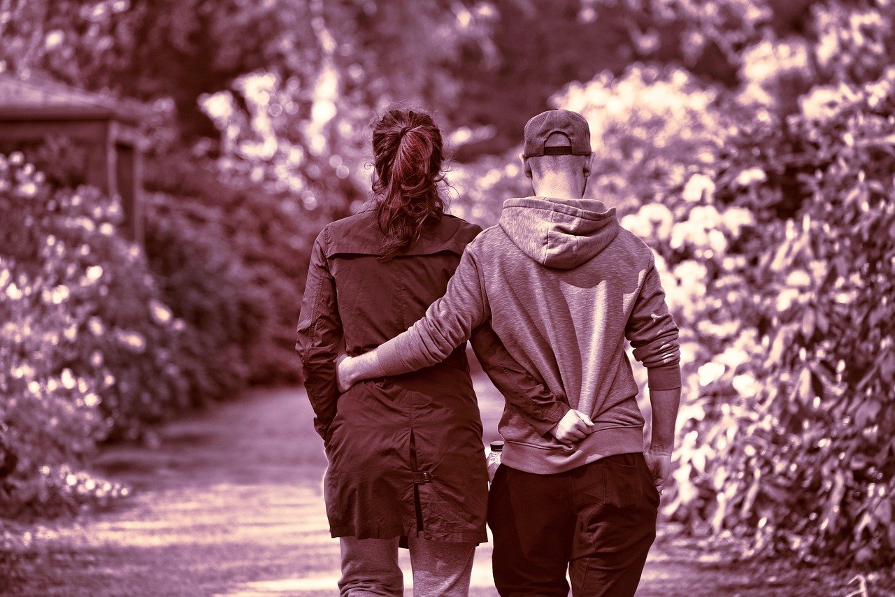 person, people, man, woman, couple, two, two people, together, arms, arms around, walking, motion, park, people, people, coup