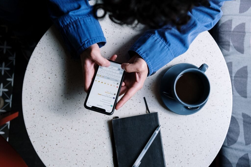 Phone and notebook used for clear booking communication