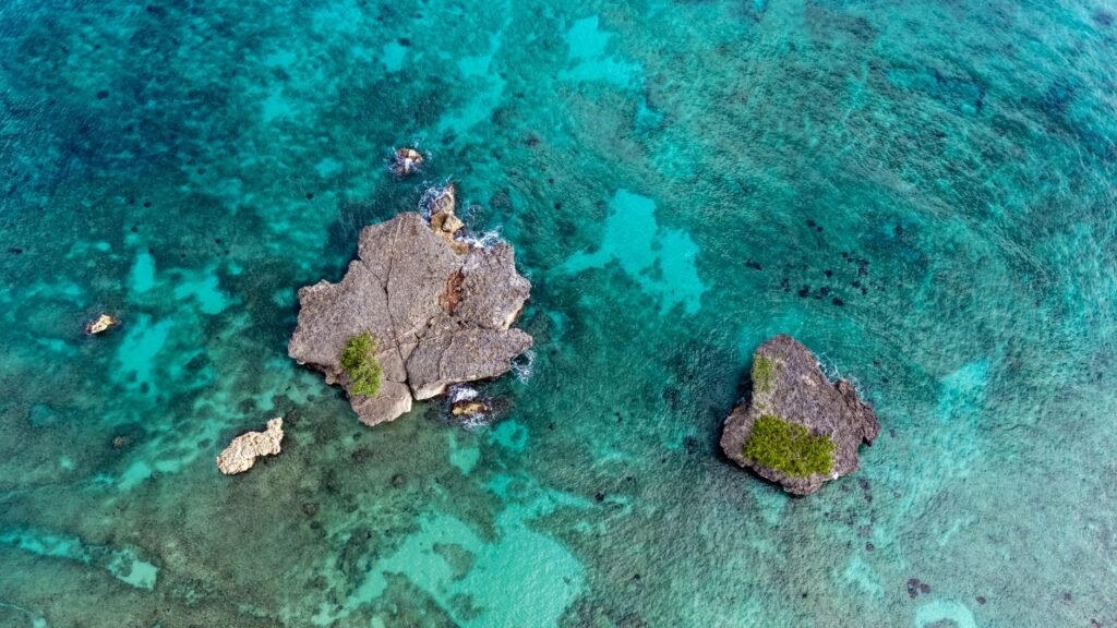 A stunning aerial view of Rio San Juan's clear turquoise waters with rocky formations.