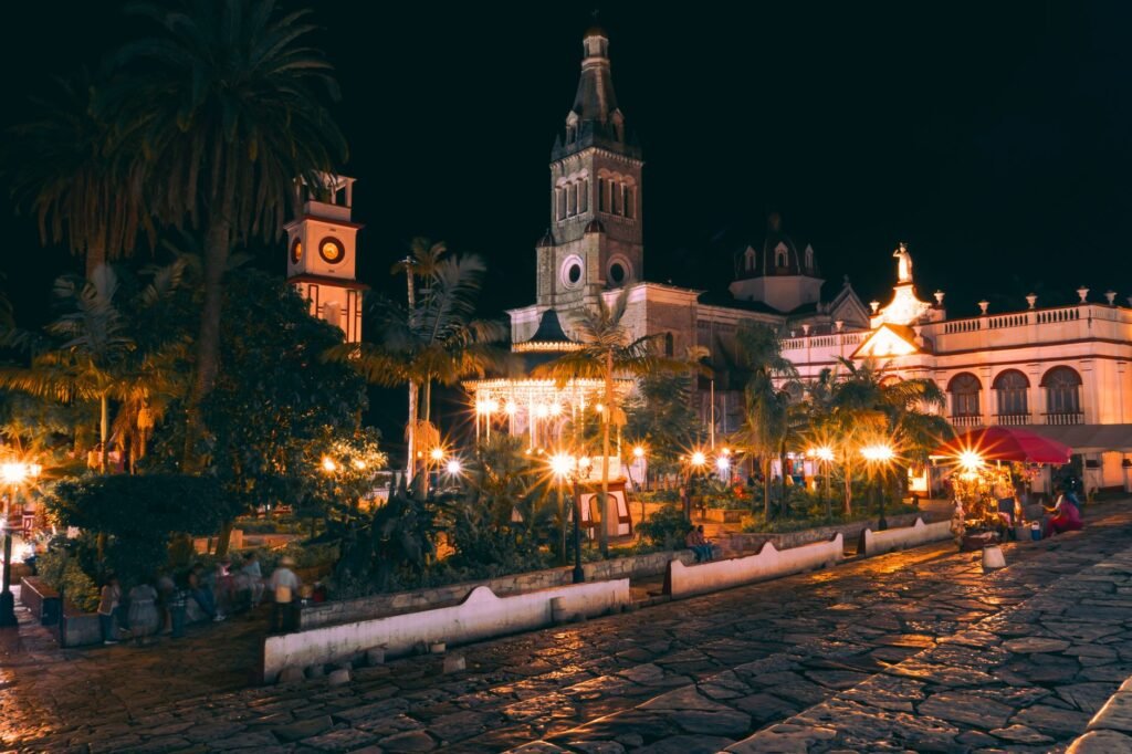 Captivating night scene of Cuetzalan's historic town square with illuminated architecture.