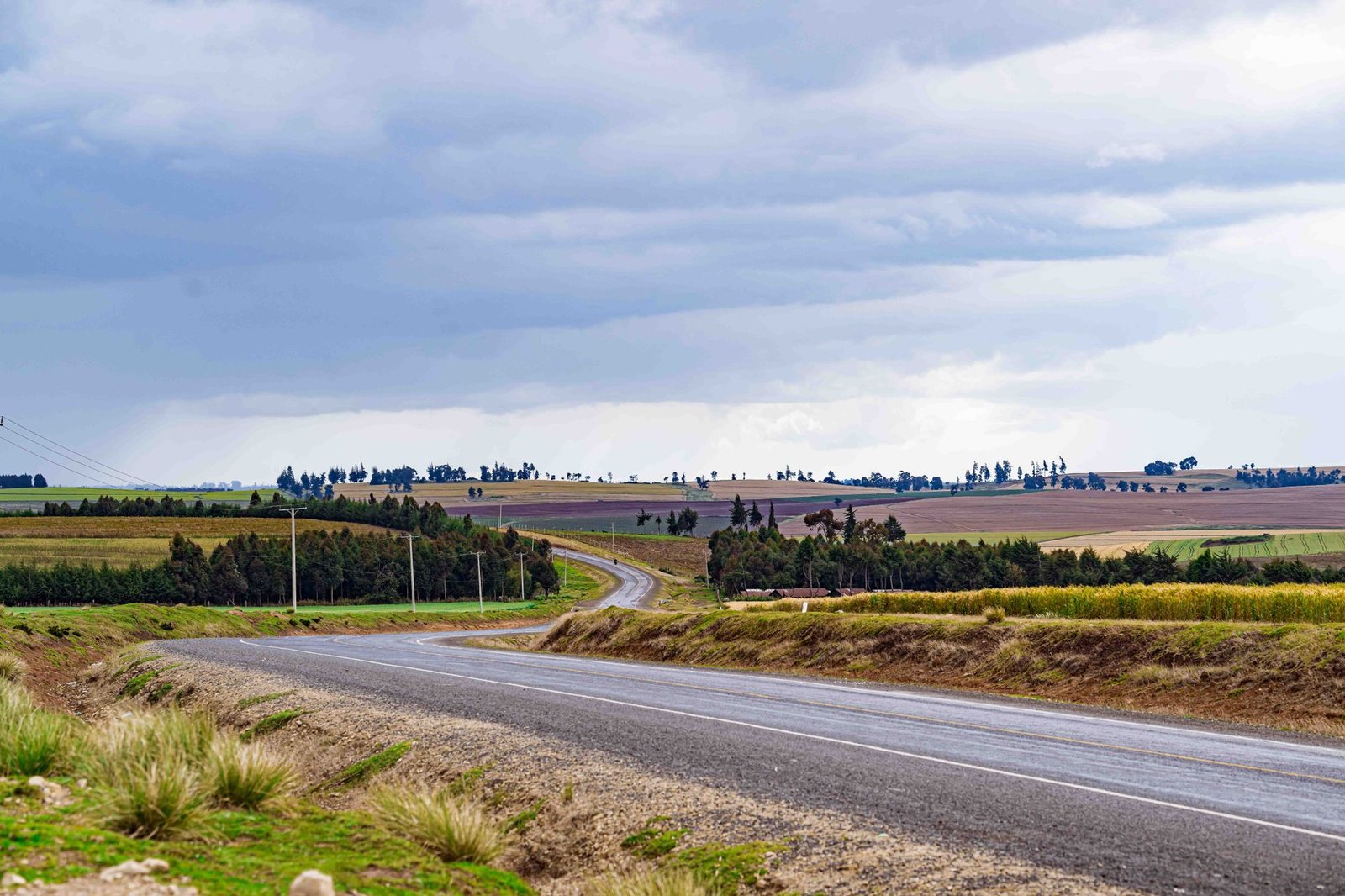Quiet rural road in Meru County, Kenya, at golden hour