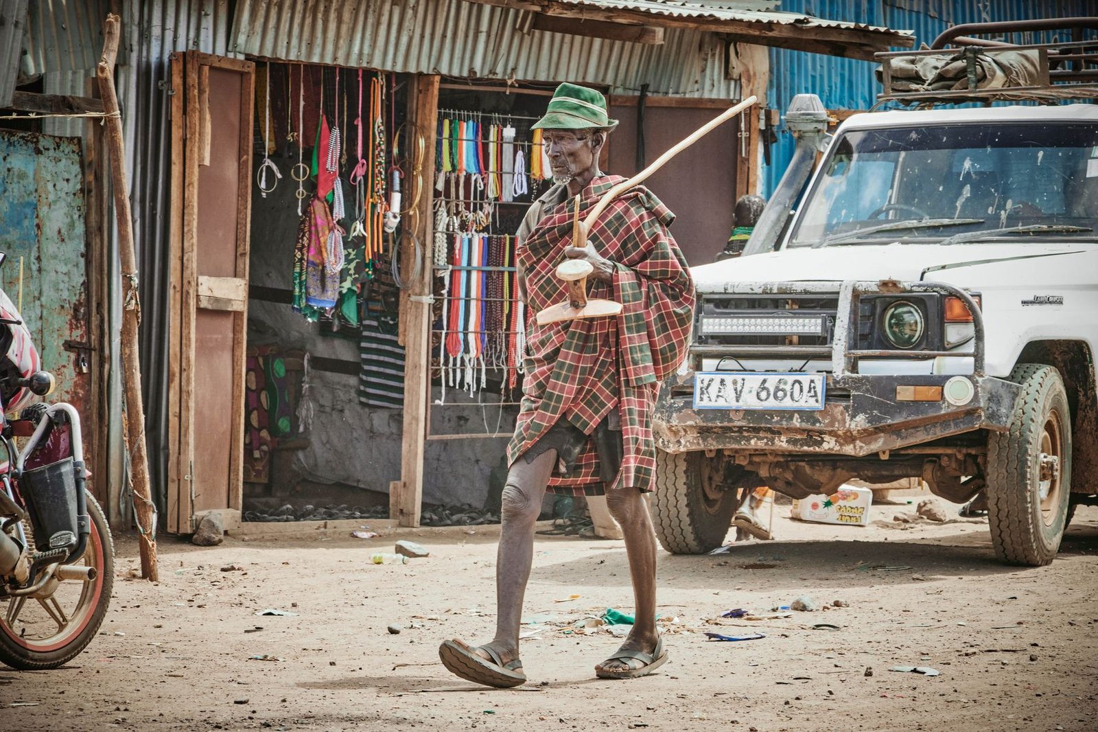 Street scene in Kitui town, Kenya, with pedestrians in late afternoon light
