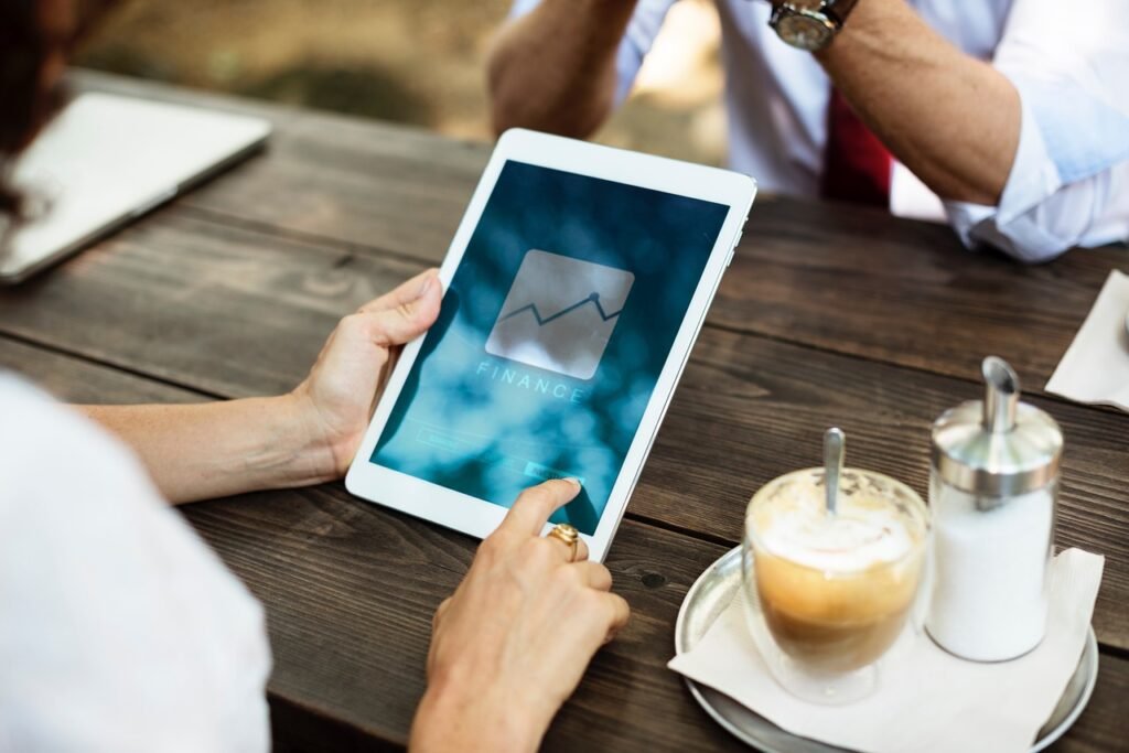 tablet, ipad, touchscreen, gadget, wooden, table, coffee, cafe, business, meeting, brown business, brown meeting, brown cafe,
