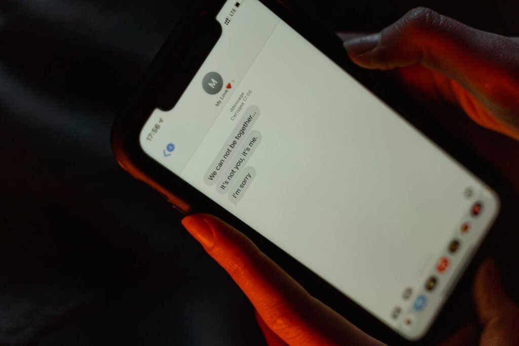 Person using a smartphone to arrange a private meet-up