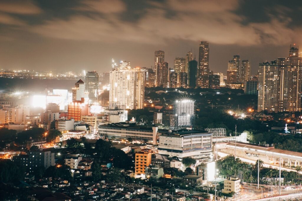 Stunning night view of Mumbai cityscape showcasing illuminated skyline and vibrant urban lights.