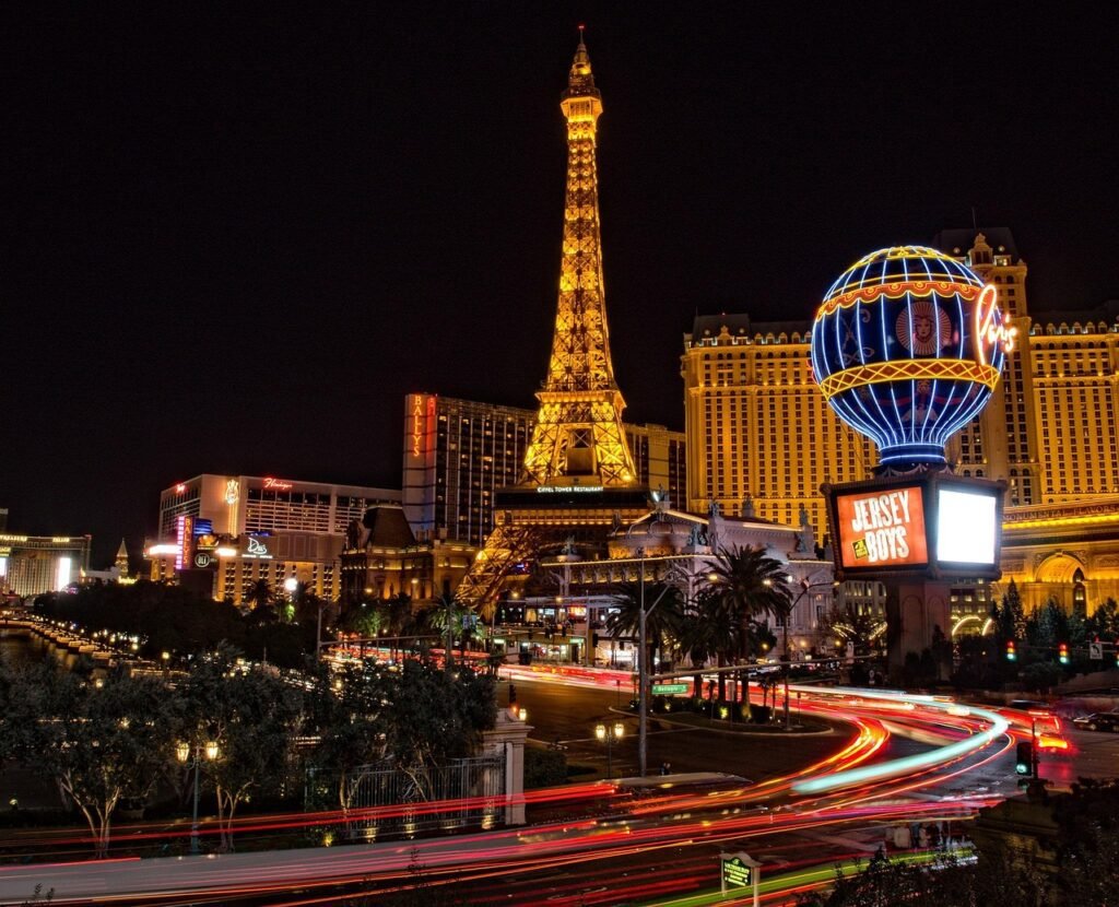 las vegas, eiffel tower, buildings, architecture, illuminated, city lights, motion blur, long exposure, casino, city, citysca