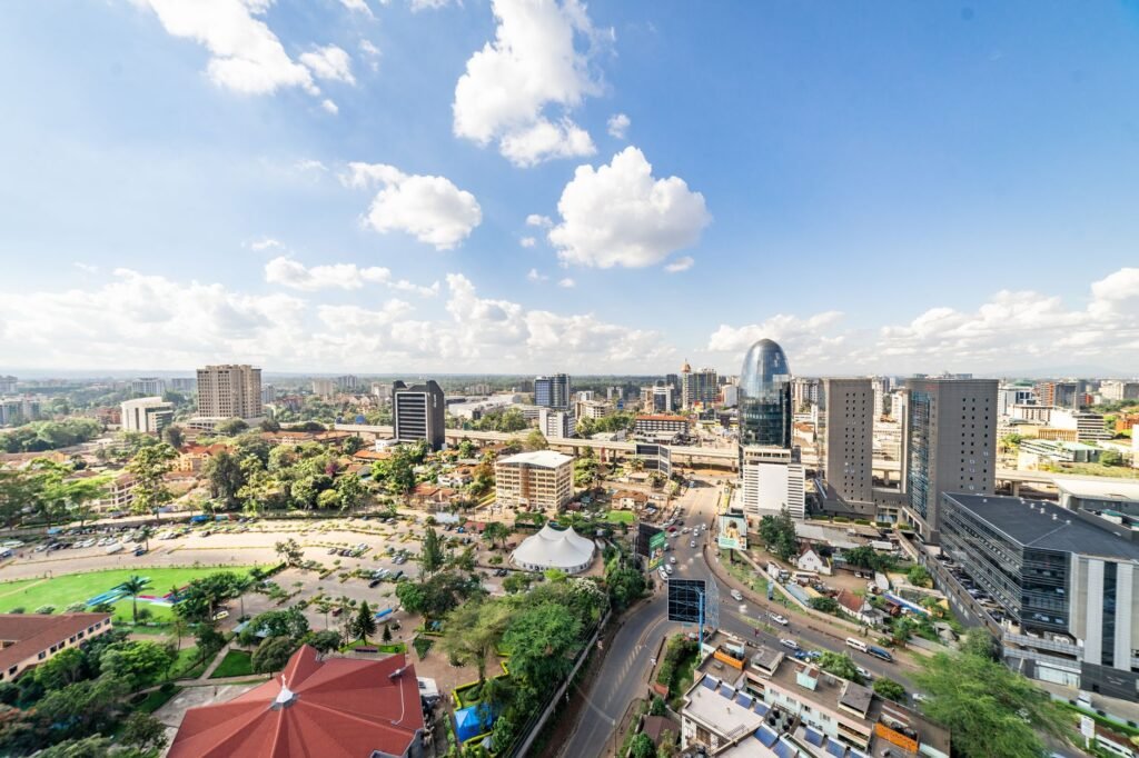 High angle view of Nairobi's skyline with modern buildings and a clear blue sky.